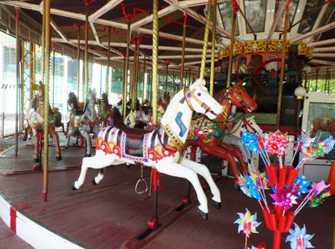 The Civic Merry Go Round with colourful horses and vintage details.